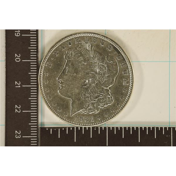 1921 MORGAN SILVER DOLLAR IN HARD PLASTIC CAPSULE