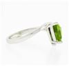 Image 5 : 14k White Gold 1.83cw Prong Set Trillion Cut Peridot Solitaire Bypass Ring