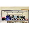 Image 1 : SHELF OF ASSORTED SKIS, SNOWBOARDS, HELMET & MORE