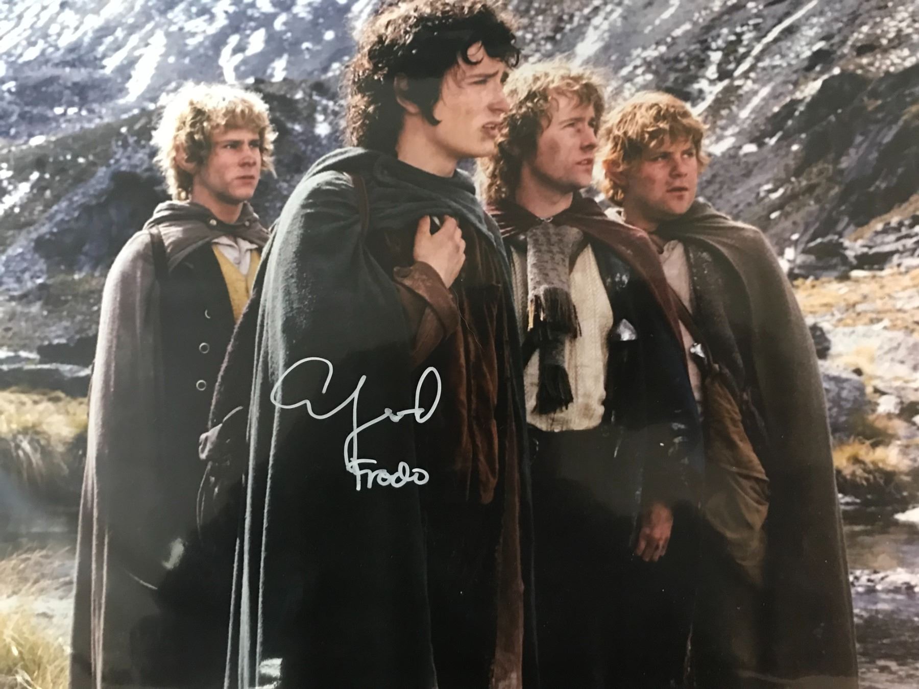 Frodo Signature ELIJAH WOOD SIGNED AND INSCRIBED 'FRODO' 8X10 PHOTO WWOC COA