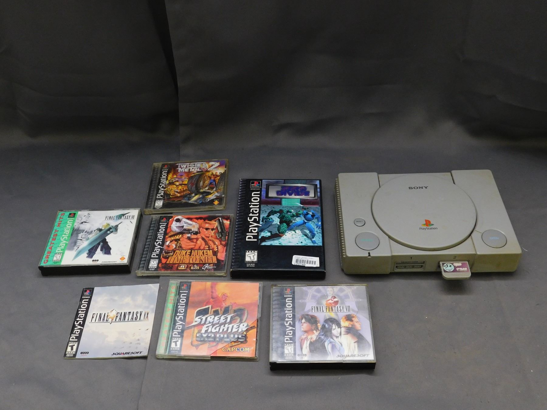 PS1 Console, 6 Games, Memory Card & Console.