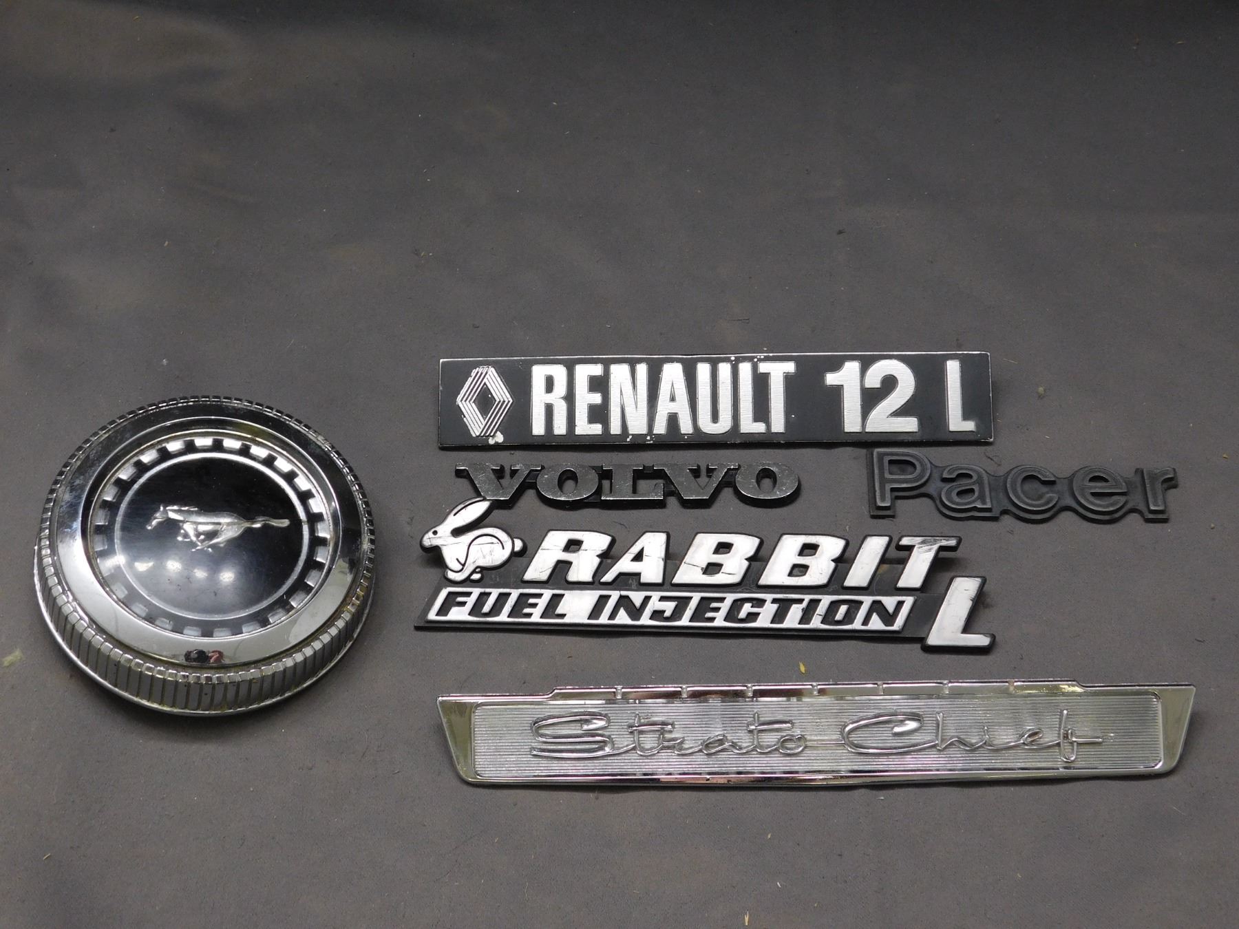 Lot of Dealership Emblems Pacer, Volvo, Renault, Rabbit, Strata
