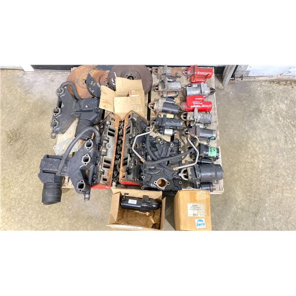 PALLET LOT FLYWHEELS, STARTERS, MERC VOLVO EXHAUST MANIFOLDS, NEW STARTER AND NEW OUTBOARD STARTER