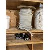 Image 2 : WOODEN SHELVING UNIT WITH CONTENTS.  8' X 6-1/2' TALL.  ROLL OF ELASTIC CORD, LEFT OVER GASKETS