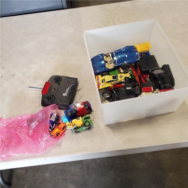 CONTAINER OF DIE CAST CARS, TRANSFORMERS AND TONKA TRACTOR
