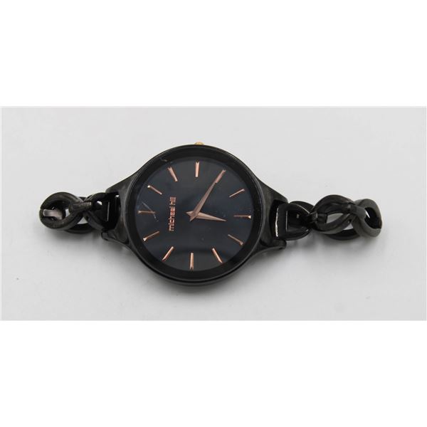 LADIES BLACK MICHAEL HILL WATCH WITH TINY SCRATCH
