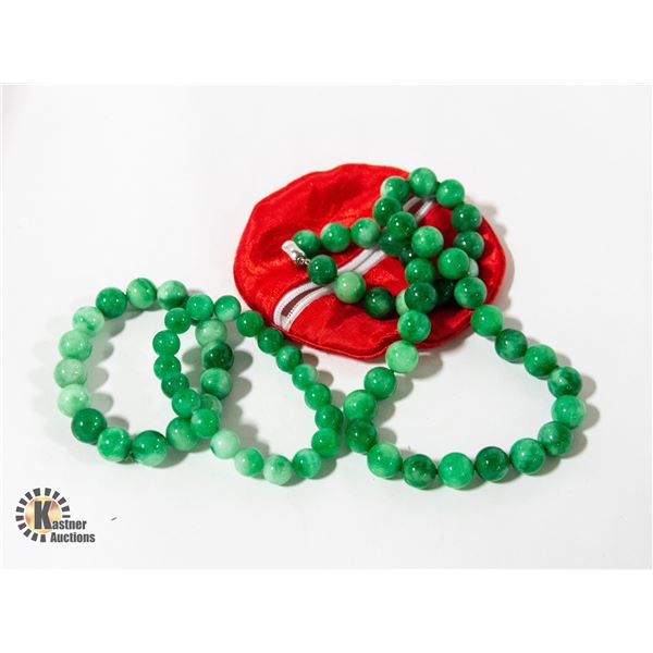 2 EMERALD GREEN BRACELETS & BEADS 20 IN MARKED