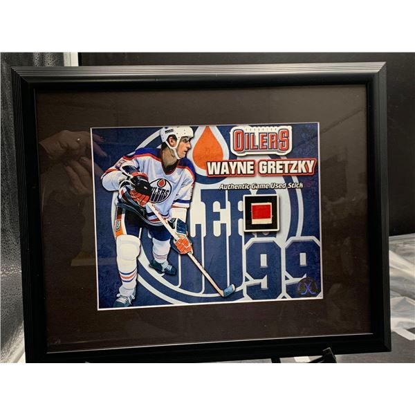 WAYNE GRETZKY #99 - COLLECTOR FRAMED PICTURE WITH GAME USED STICK PIECE: issued by: GREATS OF THE GA