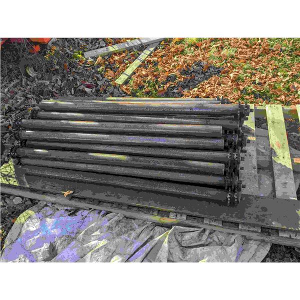 Lot of 38 conveyor rollers with welded double sprocket. Lightly used, surface rust on rollers.