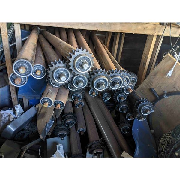 Lot of 37 conveyor rollers with welded double sprocket. Lightly used, surface rust on rollers.