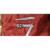 Image 1 : THE FISHERMANS SOLUTION KNIFE AND CASE THAT TURNS INTO PLIERS, HAS BUILT IN SHARPENER