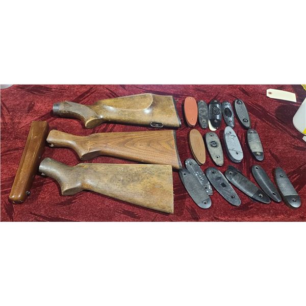 THREE STOCKS, BUTT PLATES AND UNKNOWN FOREGRIP