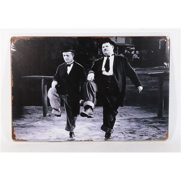 NEW LAUREL AND HARDY METAL SIGN. FAR AWAY LOOKS
