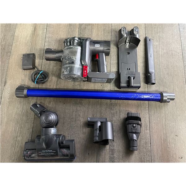 1 Dyson Stick Vacuum Cleaner with Battery, Charger, and Accessories - Used - Works/Tested