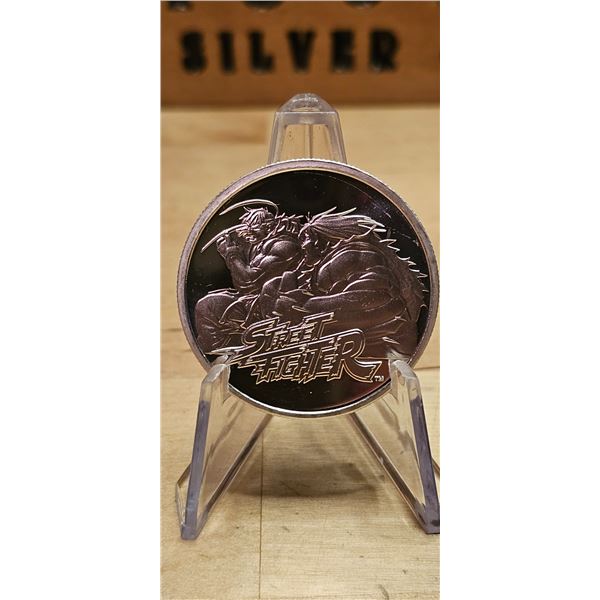 Lot 16-1) 1 oz Street Fighter Samoa Silver Coin
