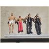 Image 1 : four wrestlers