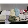 Image 1 : Large lot of clothes (bedsheet covers, table clothes, napkins etc