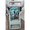 Image 3 : garden hose spinner with hose, nozzle and a split with extra hose