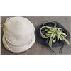 Image 1 : navy and green fascinator and felt hat