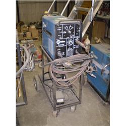MILLER ECONOTIG ELECTRIC WELDER, s/n KF929044: