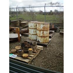 QUANTITY (1) PALLET OF WATER & GAS METER LIDS, PALLET OF BARRELS, & (2) PALLETS OF DISC PARTS