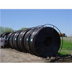 (6) SPOOLS OF 1in. - 2in. POLY PIPE (APPROX 7,000ft. PER SPOOL)