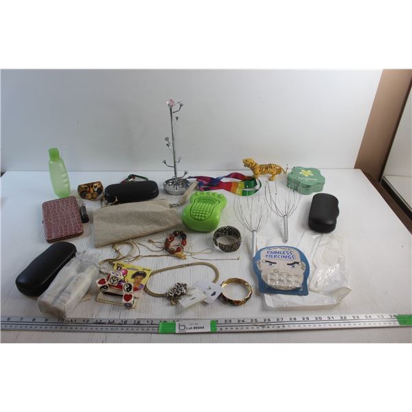 Painless Piercing, Jewelry, Glasses Cases, Head Massager, Foot Massager and Misc.