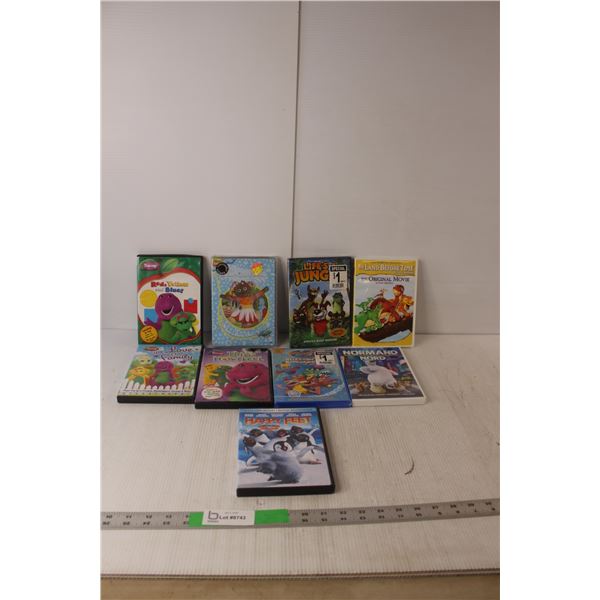 (9) Kids DVDs- The Land Before Time, Barney, Happy Feet, Misc.