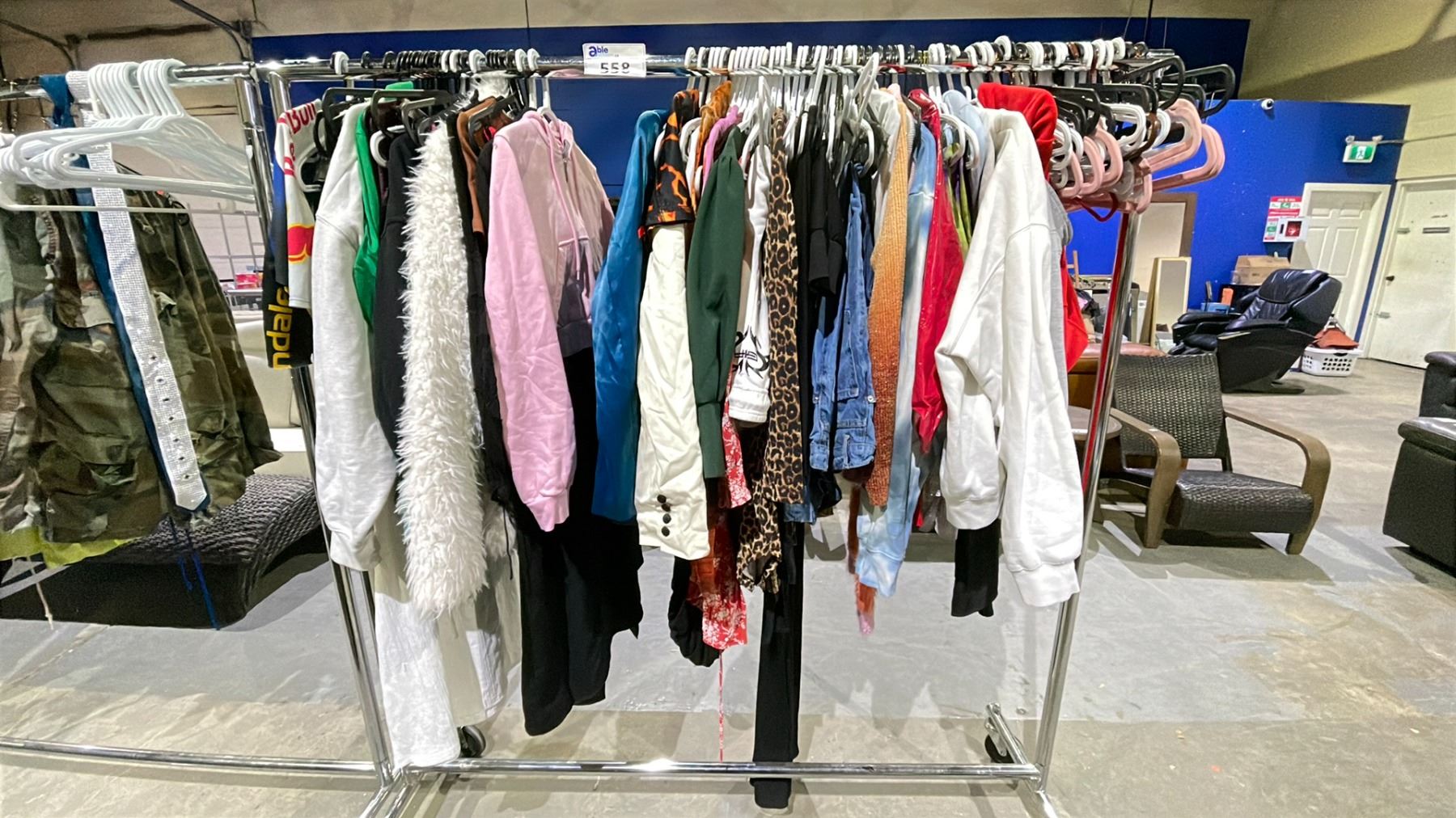 RACK OF ASSORTED CLOTHES (RACK NOT INCLUDED) - Able Auctions