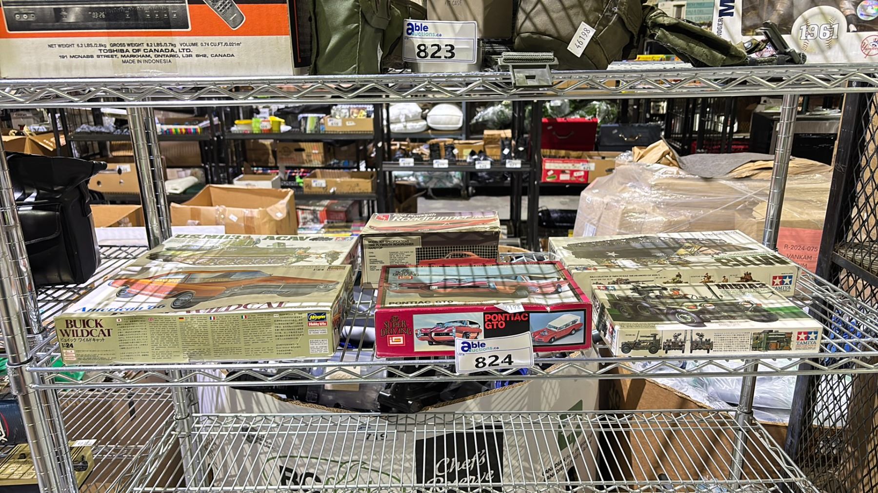 Model Tank Shelf SHELF LOT OF UNASSEMBLED MODEL CARS AND ARMY TANKS