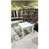 Image 2 : WHITE TABLE WITH 3 CLEAR DINING CHAIRS