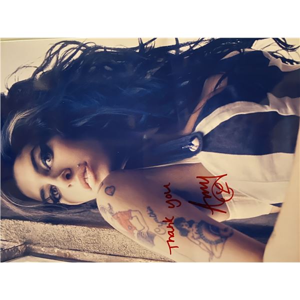 Amy Winehouse signed photo. 8x10 inches