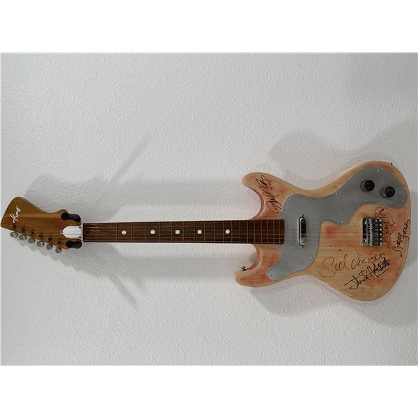 Rare Sex Pistols band signed guitar