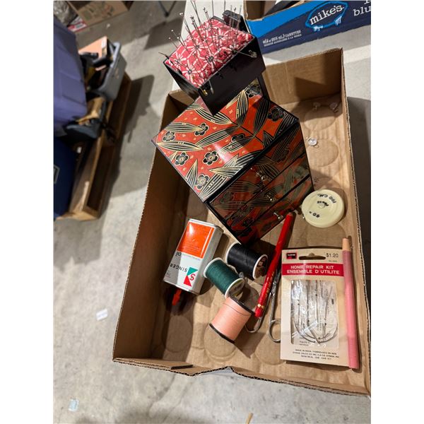 Small sewing drawers with pin cushion and other items