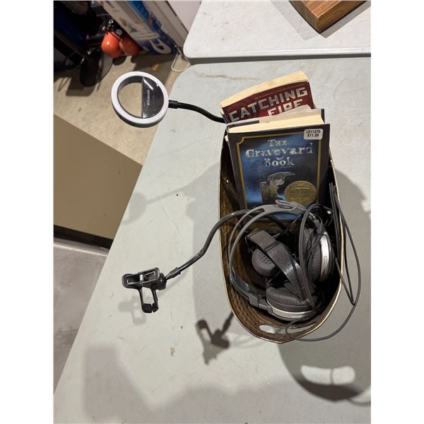 Polaroid ring, light books and headphones