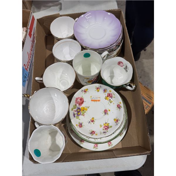 Assorted tea, cups, and saucers