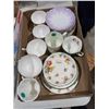 Image 1 : Assorted tea, cups, and saucers