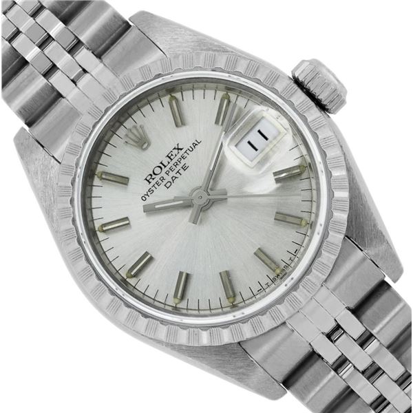 Rolex Ladies Stainless Steel Silver Index Engine Turn Bezel Date Wristwatch With