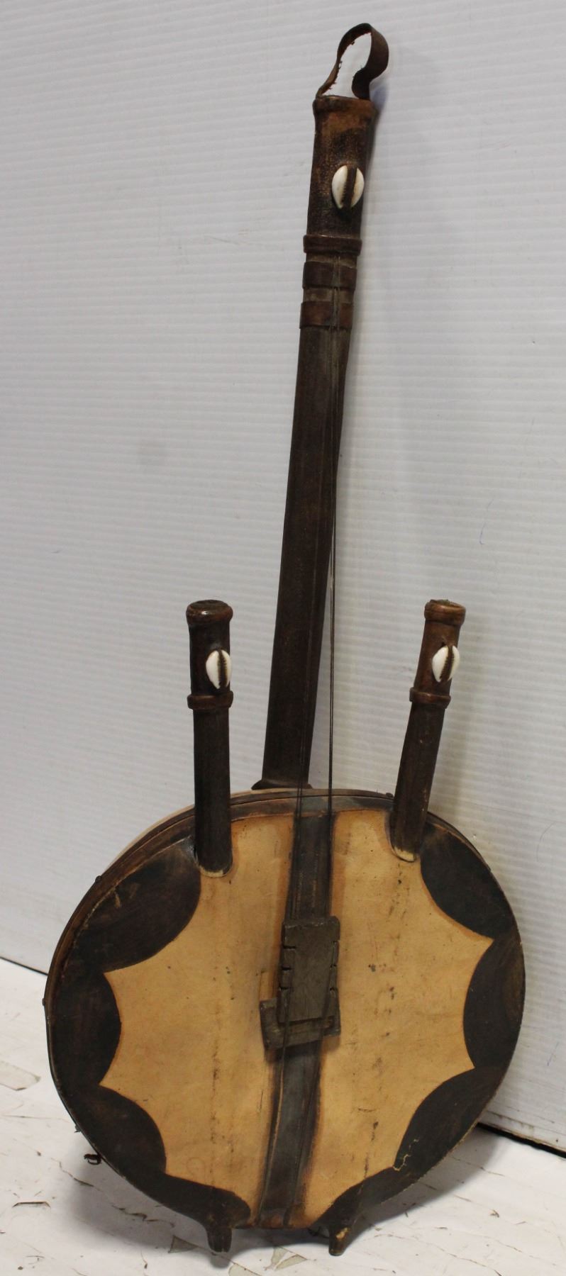TWO HAND THUMB STRING INSTRUMENT