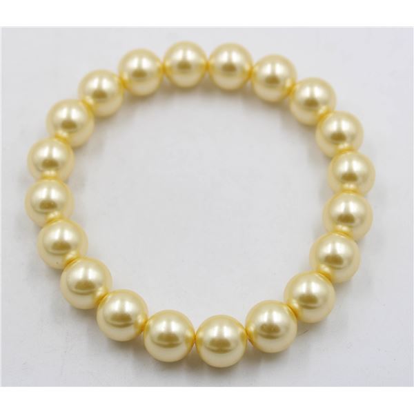 #114-SEA SHELL PEARL BRACELET 10MM/7.5"