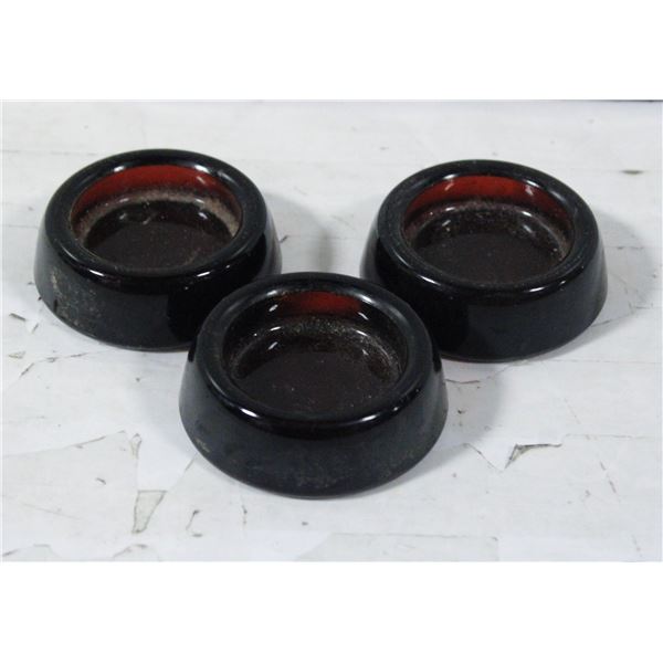 3 VINTAGE AMBER GLASS FURNITURE CASTERS