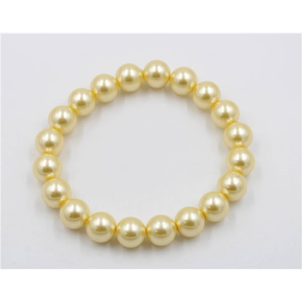 #116-SEA SHELL PEARL BRACELET 10MM/7.5"