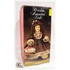 Image 1 : PORCELAIN ANIMATED DOLL IN BOX