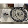 Image 1 : PAIR OF REAR RIMS WITH TIRES, 2 BELLS, BIKE WRENCH, LIGHT, REFLECTOR AND HANDLEBAR BASKET