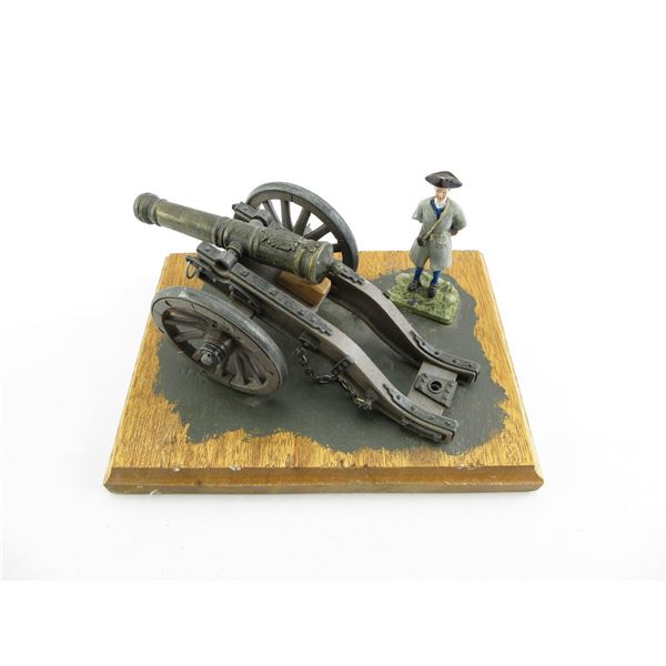 CANNON WITH SOLDIER FIGURINE
