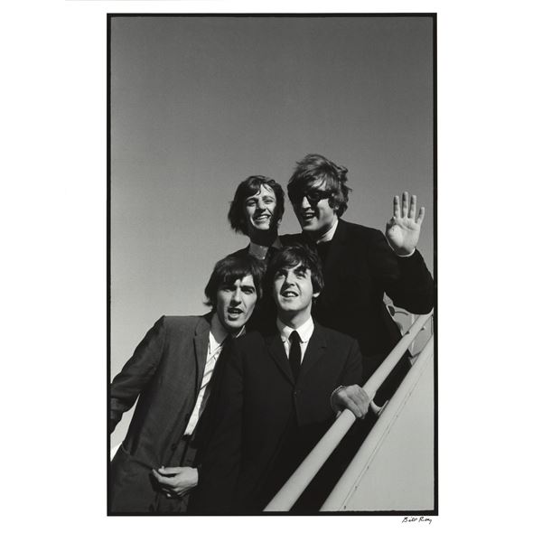 Photographer Bill Ray signed The Beatles arriving at Los Angeles airport on their second US tour.