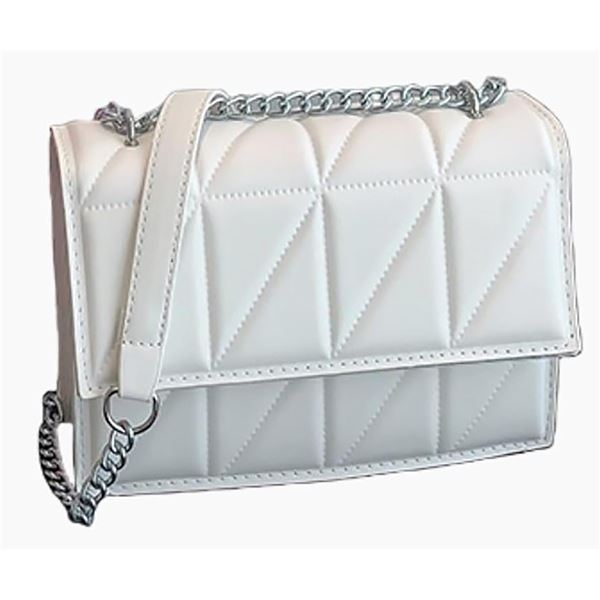 Brand new dressy small ladies faux leather handbag in white.