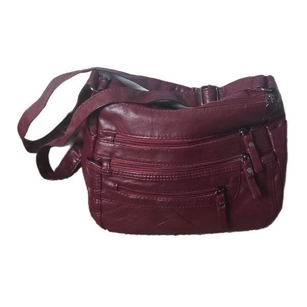 Brand new wine ladies PU leather shoulder orangiser bag.