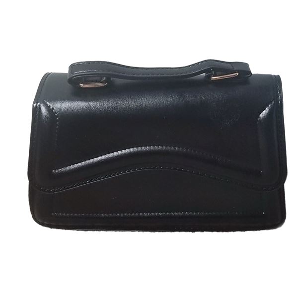 Brand new black asymmetric PU leather evening bag.