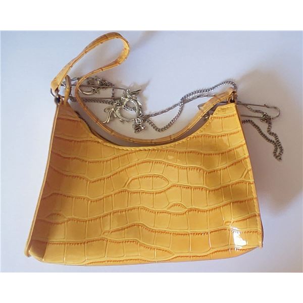 Brand new colourful yellow croc style crossbody with metal detail styling.